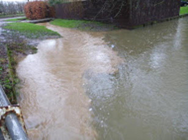 Photograph of the visual impact of sediment entering the River Dun at times of high flow