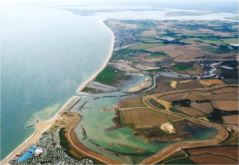 Aerial photograph of Medmerry, Sussex, including the managed realignment flood defence scheme