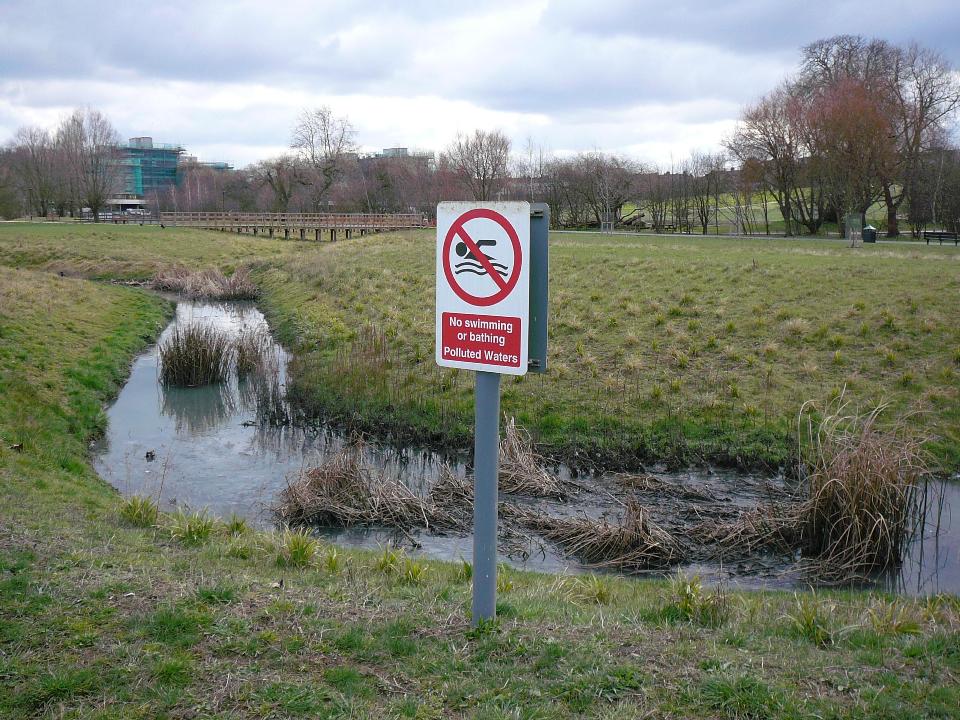 Pollution warning sign on the Moselle Brook